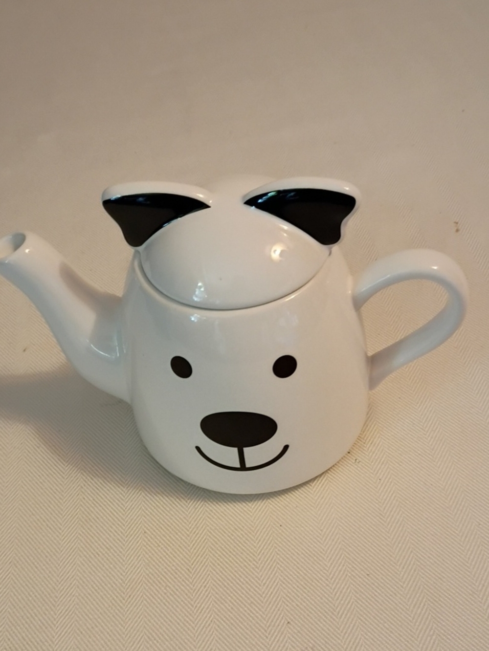 Cute White Ceramic Dog Teapot with Black Accents. Temptations
